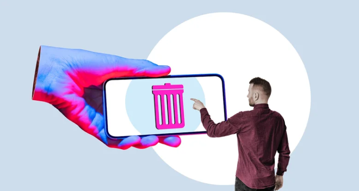 شخصی در تصویر در حال پاک کردن اپلیکیشن ها و در واقع حذف گوشی موبایل از زندگی است. سطل زباله را در اسکرین گوشی موبایل می بینیم. مفهوم عکس در رابطه با مینیمالیسم دیجیتال و پاکسازی ابزارهای دیجیتالی است.
